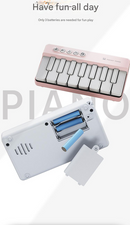 Mini Pocket Piano Electronic Keyboard - 19 Keys, Multiple Modes, LED Lights, Portable Musical Toy(pink)